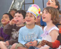 Preschool Kids Laughing at Jersey Jim's magic show
